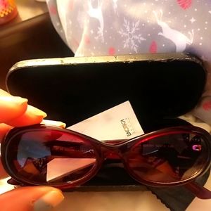 Ralph Lauren Sunglasses w/ case and cleaning cloth included.